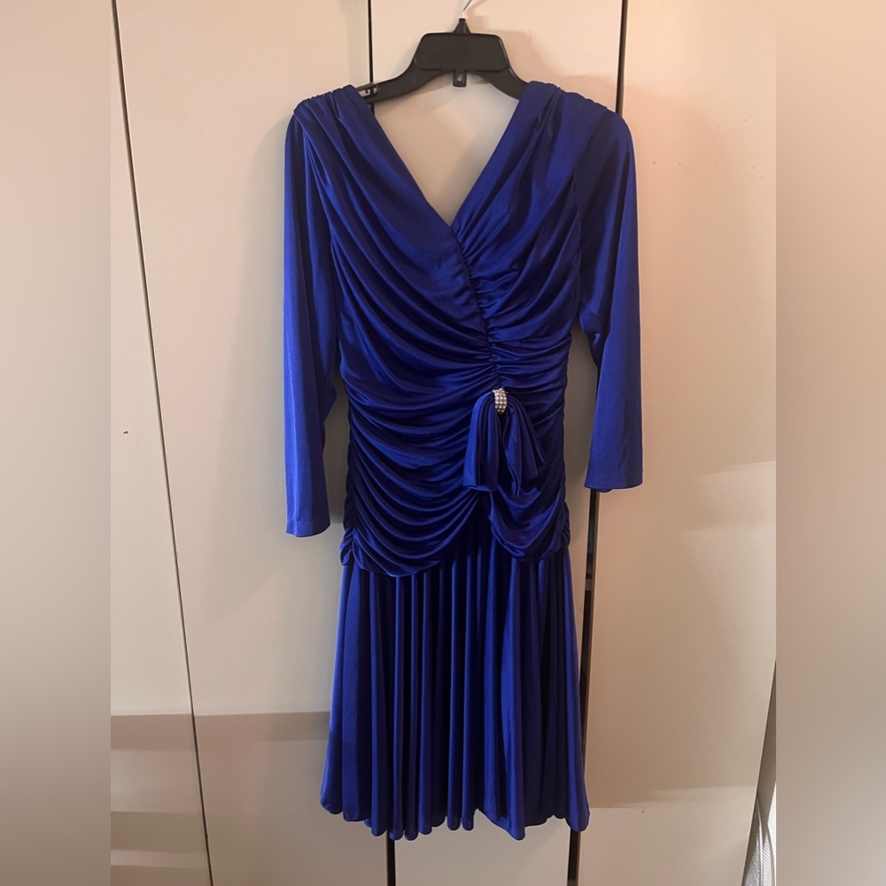 Blue formal dress size twelve never worn before. new condition
